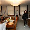 Theresa Golden, executive director at Refuge for Women, a non-profit shelter created to protect women and spread awareness for the survivors of sex trafficking, sexual violence, and exploitation, walks through the living/dining room area.