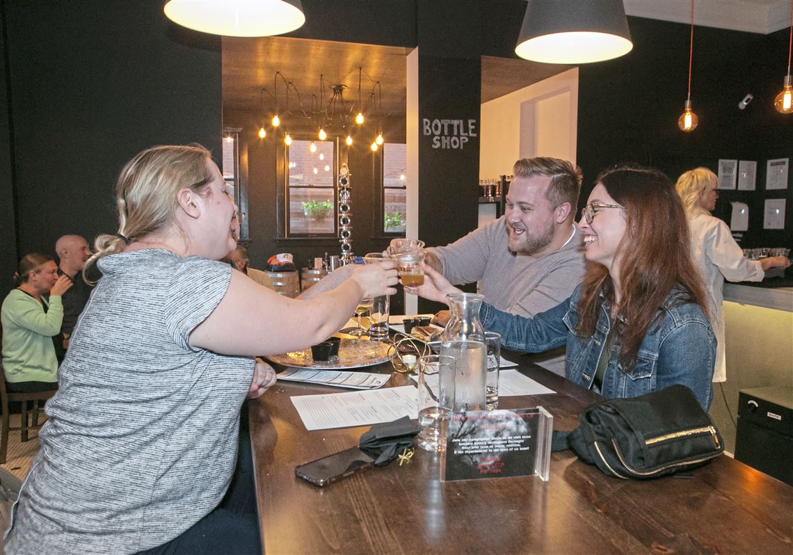 Quantum Spirits' "Campfire Cocktails" class included Alyssa Harnick, left, Matthew Sartore and Lucy Sedor-Franzak.