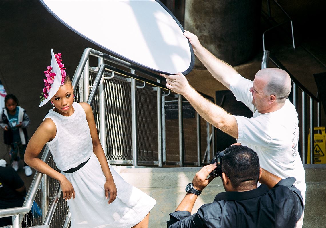 Model Miyah Knight poses for a photo during a Style Week Pittsburgh pop-up photo shoot Downtown on June 26, 2015. The five-day event will return for its third year Aug. 12-16.