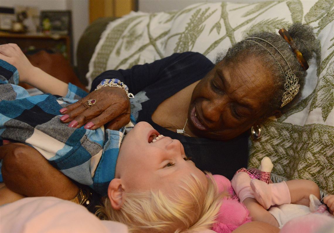 Brian Slaczka, 4 of Turtle Creek, shares a moment with Clara Hopson, 85, at the home of Bernadette Obermeier in Whitehall.