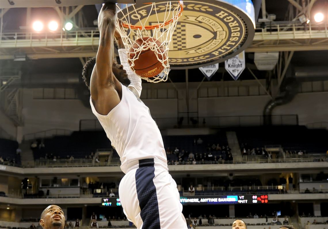Pitt's Jamel Artis dunks against Virginia Tech in the second half Sunday at Petersen Events Center.