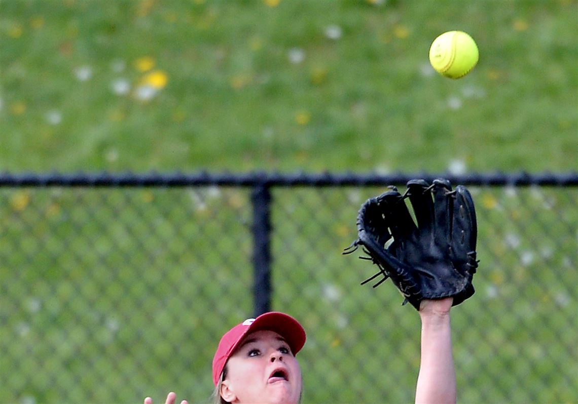Moon's Alyssa Sisko pulls in a fly ball against North Allegheny Tuesday afternoon.