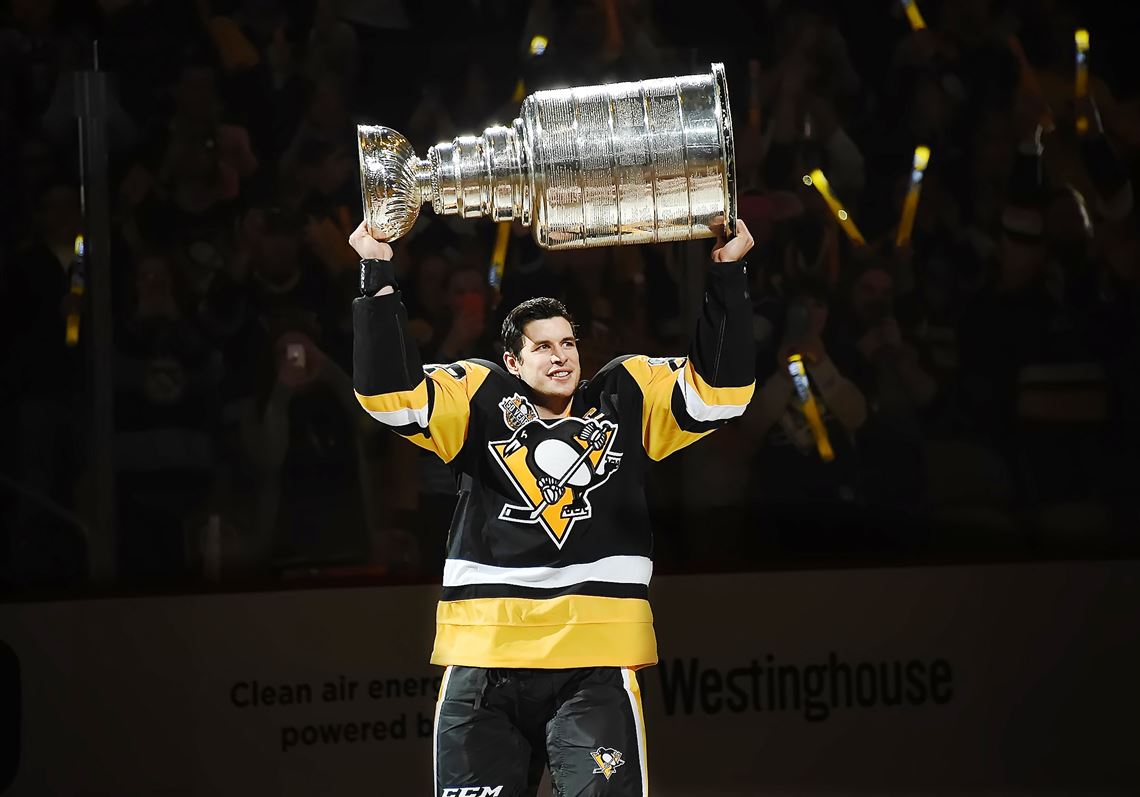 Pittsburgh Penguins center Sidney Crosby (87) waves a Terrible Towel in  support of the Pittsburgh Steelers following the Penguins 5-1 win against  the Boston Bruins at the PPG Paints Arena in Pittsburgh