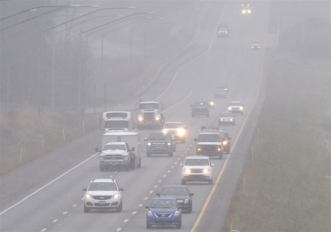 A snowy haze for drivers heading south on I-79 toward the  Wexford exit as snow started to come down after noon.