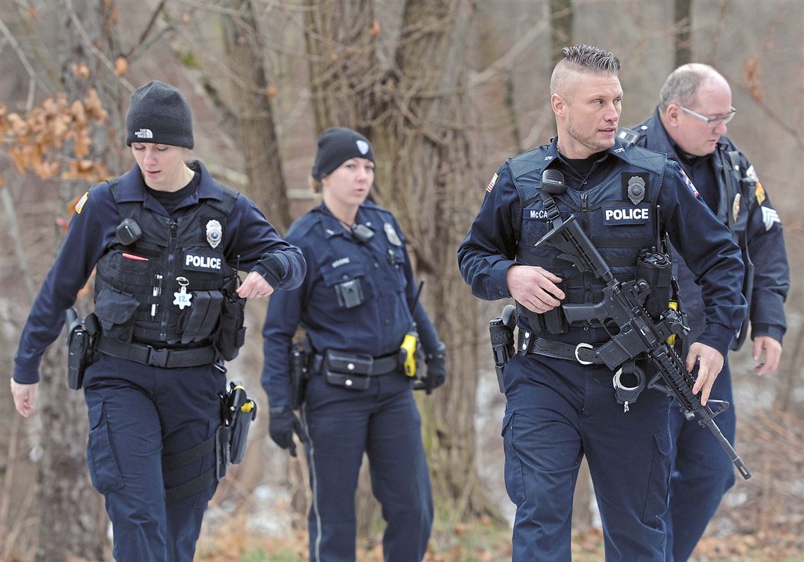 Police search for suspects following shootout between vehicles in