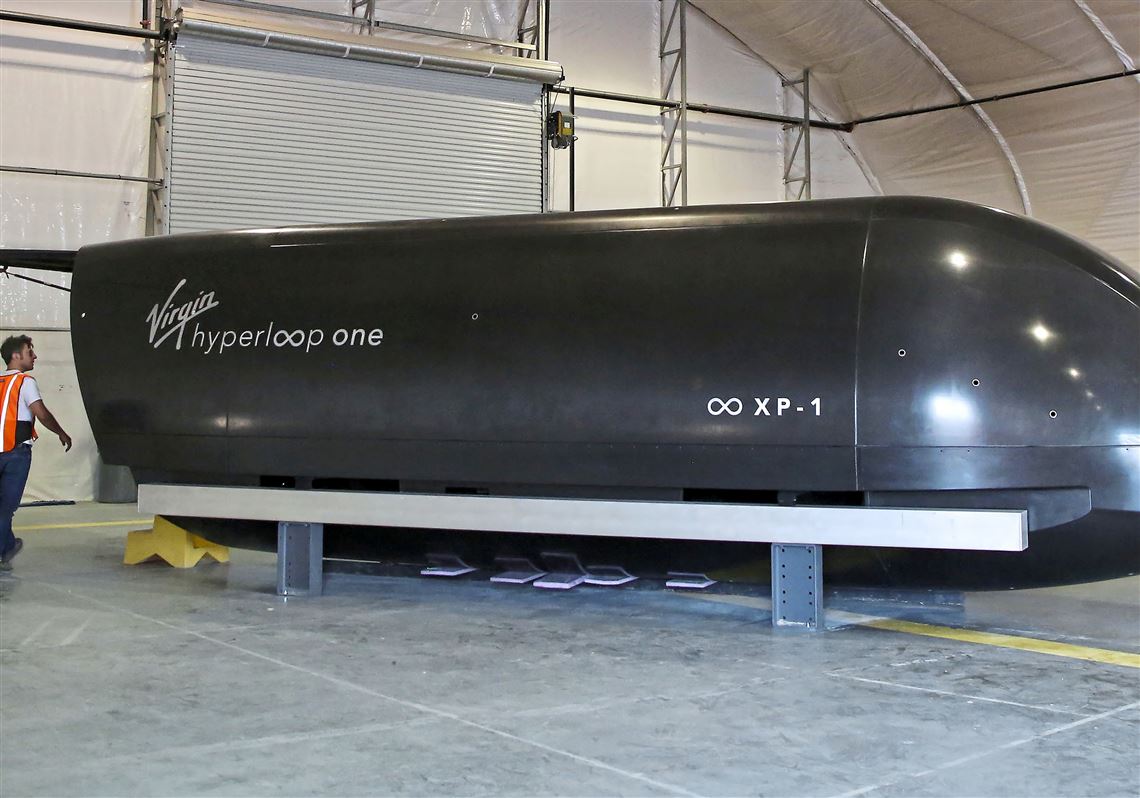 This file photo shows a Virgin Hyperloop One "cargo" pod at the Virgin Hyperloop One testing facility in Apex, Nev., on May 18, 2018.