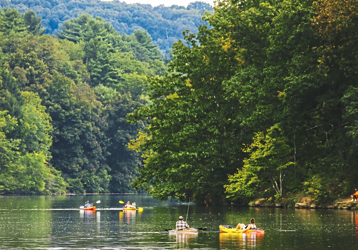 Kayakers  on the lake at Raccoon Creek State Park.