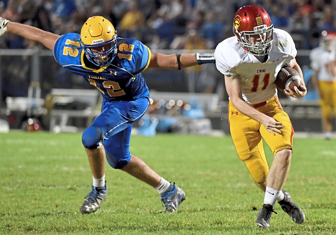 Derry Area linebacker Dom DeLuca leading the Trojan's charge on defense