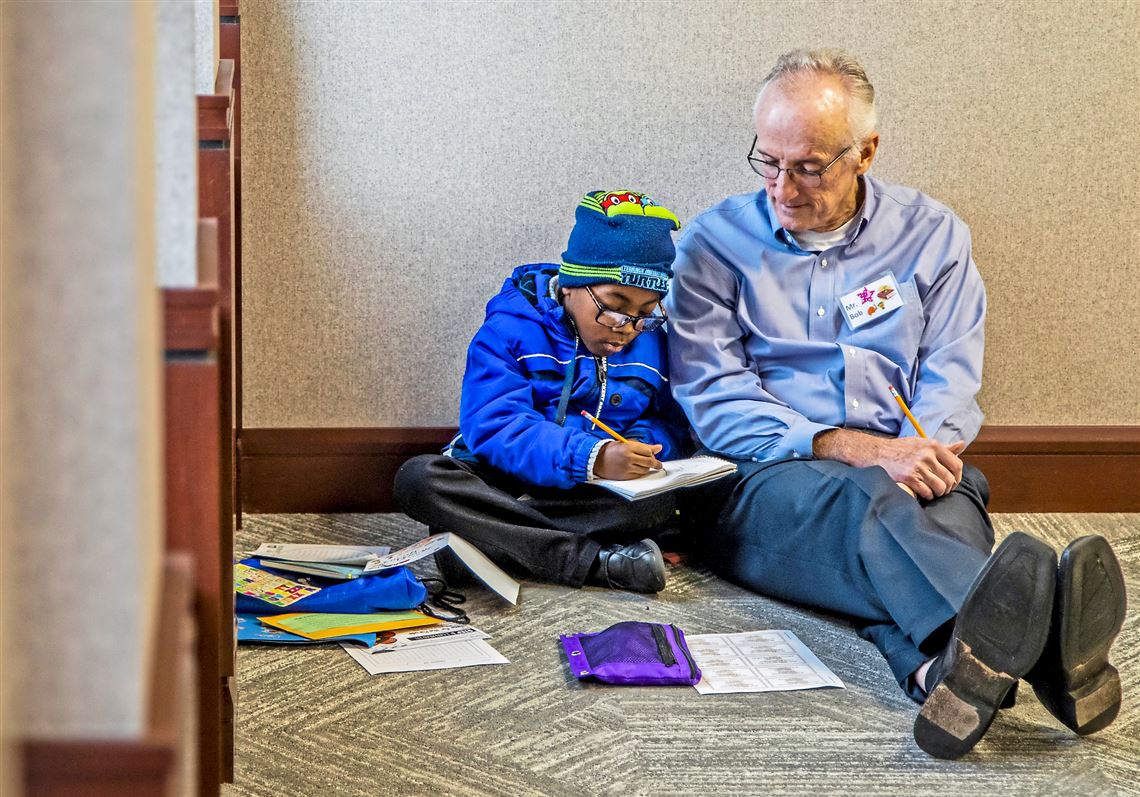 Second- and third-graders and their reading buddies team up at Eckert Seamans