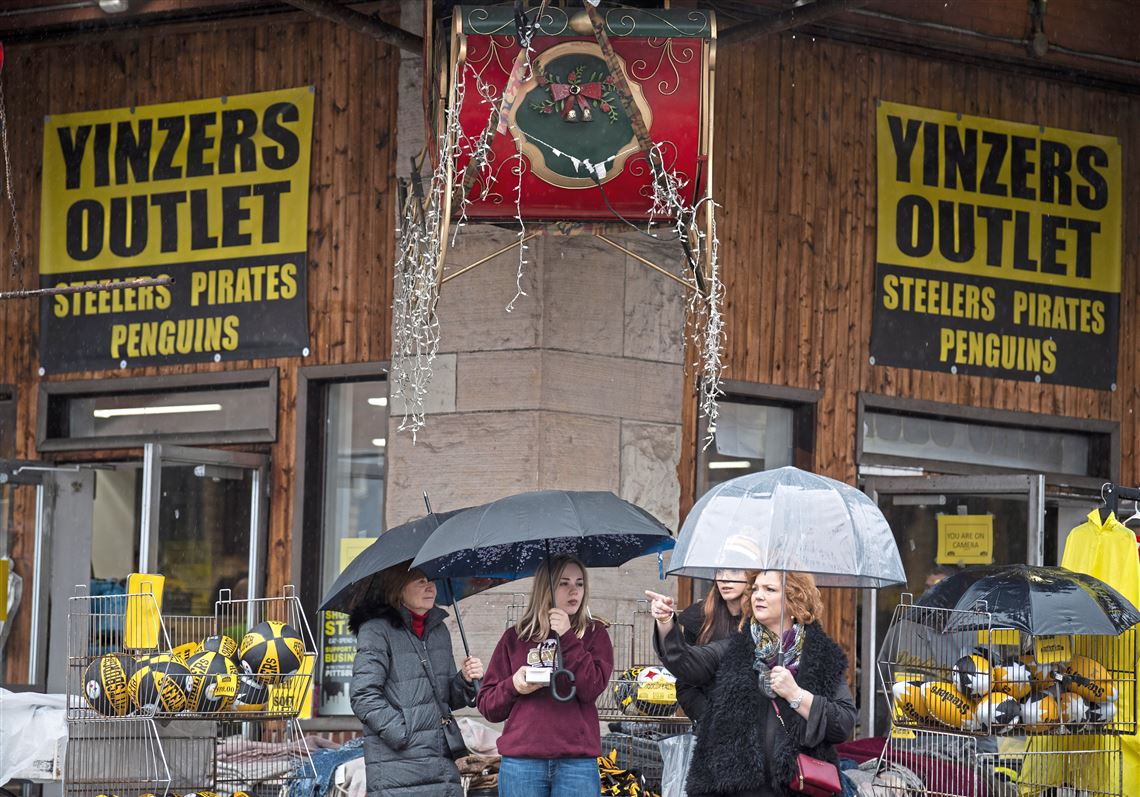 Pittsburgh Pennsylvania PA the famous Strip District with shops selling  sports souvenirs of YINZERS, YINZ, BURG Stock Photo - Alamy