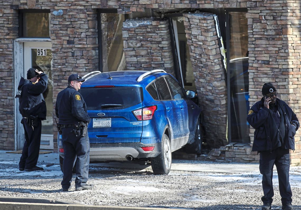 Vehicle strikes commercial building on Banksville Road Pittsburgh