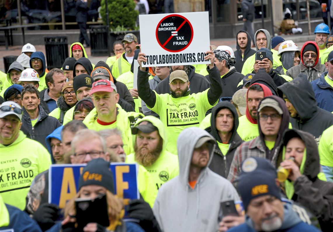 Officials and unions urge enforcement of tax laws in construction industry