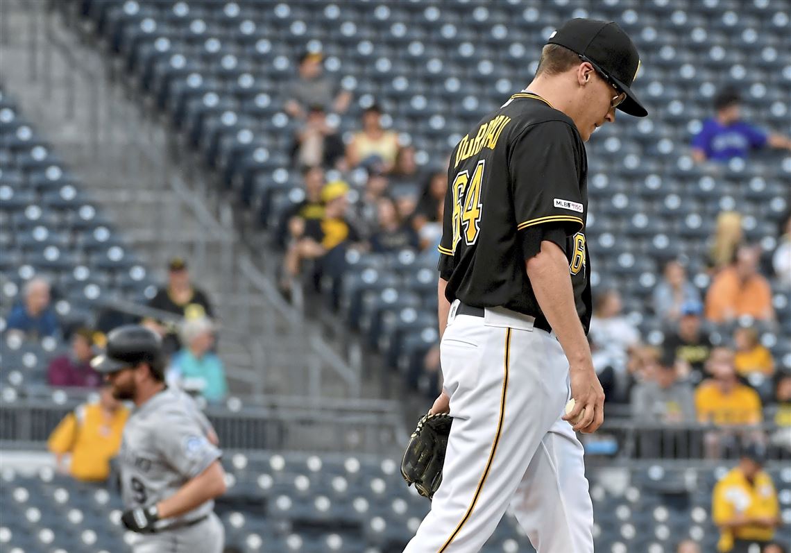 Formr Pirtae player Andy Van Slyke congratulates Pittsburgh