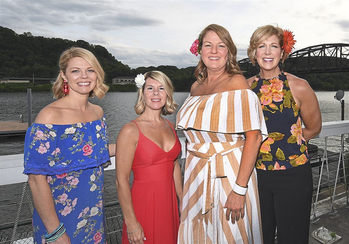 Event co-chairs Jill Friday, left, Jeannine Blyth, Sarah Tuthill and Kristin Fox on Friday at the Aspinwall River Rocks: Havana Nights event at Aspinwall Riverfront Park. 