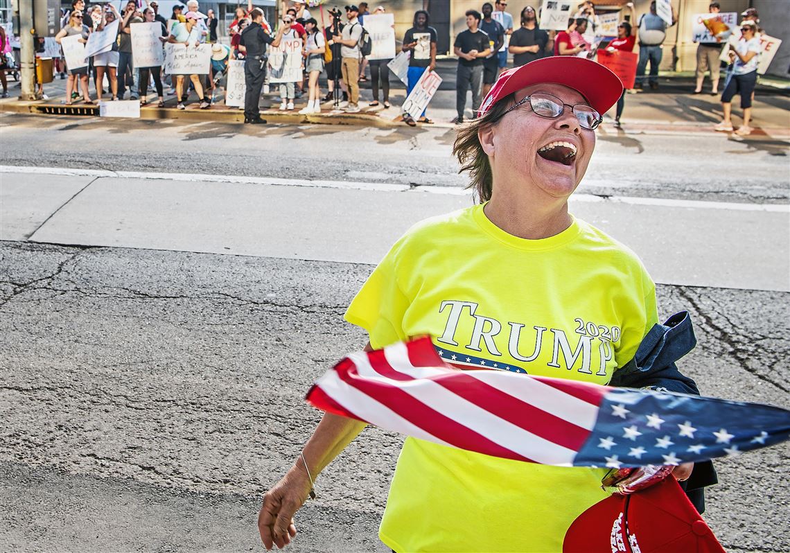 Trump supporters, detractors greet the president at private fundraiser in Wheeling