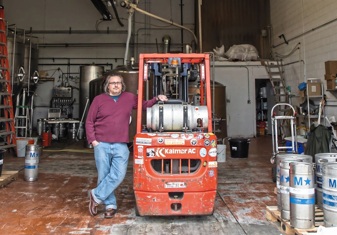 Full Pint Brewing Co. co-owner Barrett Goddard poses for a portrait at the brewery on Monday, March 30, 2020, in North Versailles.   (Andrew Rush/Post-Gazette) 