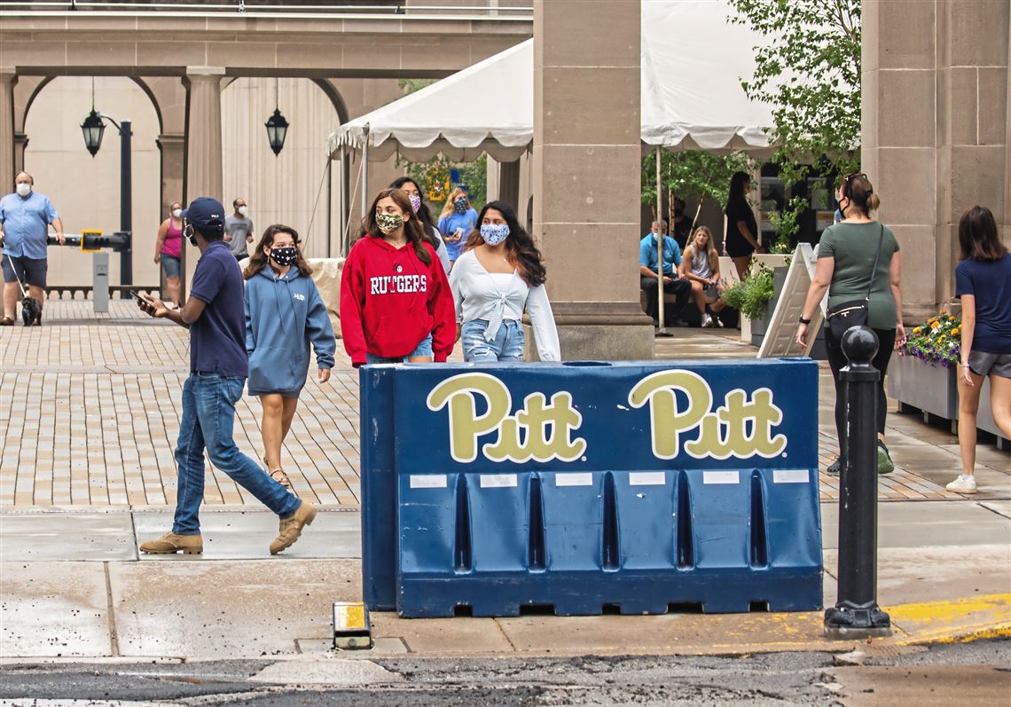 Masked students at the University of Pittsburgh on Tuesday in Oakland.