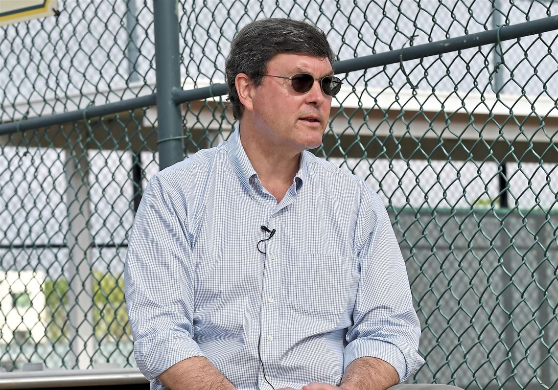 Pirates' Bob Nutting in photo with fan in 'Sell the Team' shirt