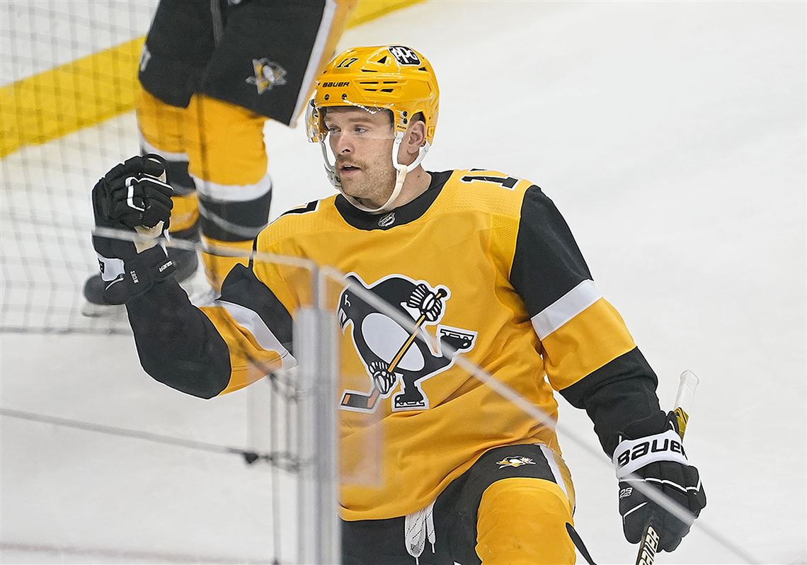 Pittsburgh Penguins' Kasperi Kapanen (42) celebrates his third goal of the team's  NHL hockey game against the Minnesota Wild, during the third period in  Pittsburgh, Saturday, Nov. 6, 2021. The Wild won