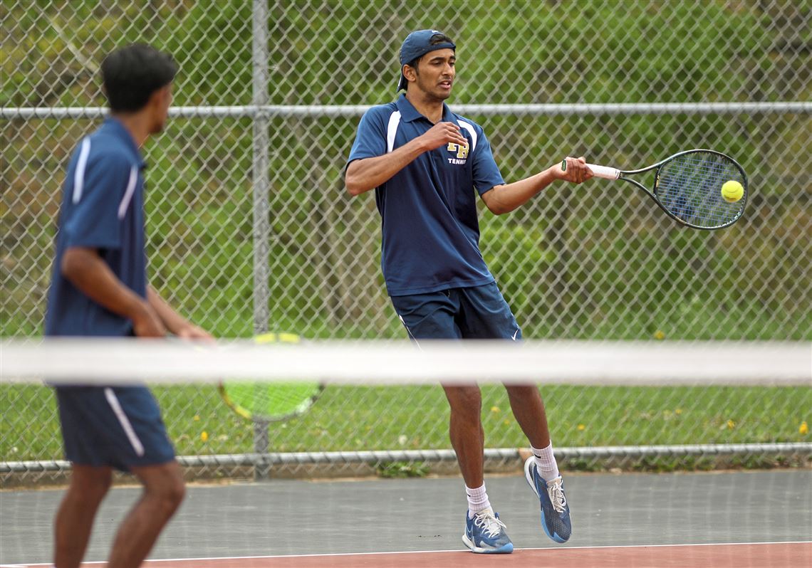 High school tennis champion is sharing the game with others