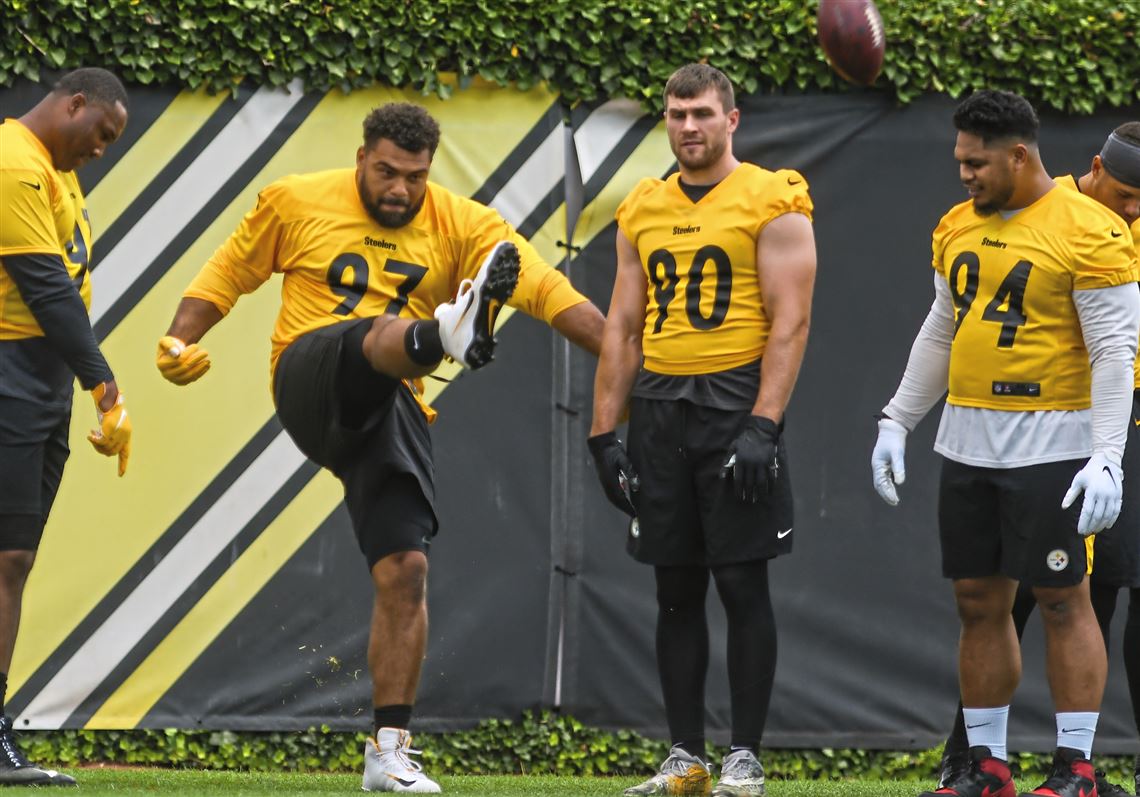 Check out Steelers LB T.J. Watt as he signs a baby at training camp