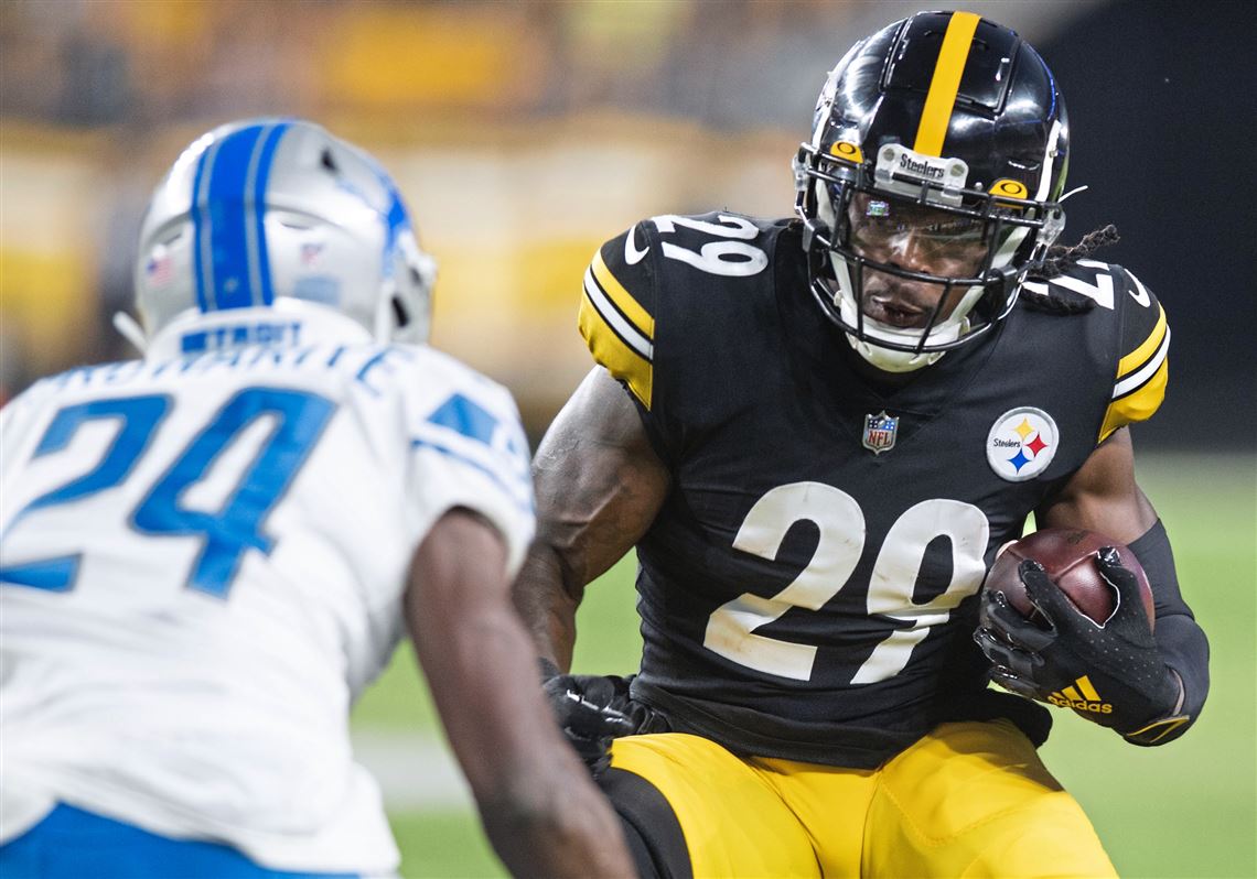 Pittsburgh Steelers running back Kalen Ballage (29) tries to get around  Detroit Lions cornerback Amani Oruwariye (24) in the first half of an NFL  preseason football game, Saturday, Aug. 21, 2021, in