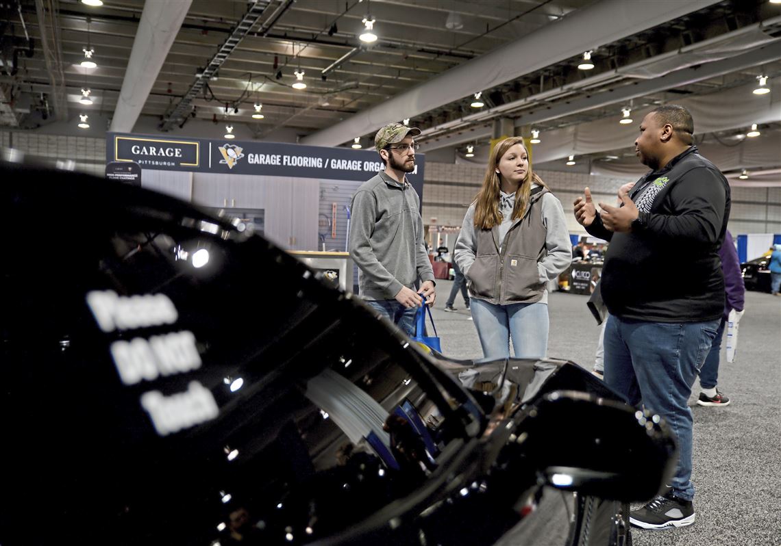 Auto show attracts visitors at a time when industry is in turmoil