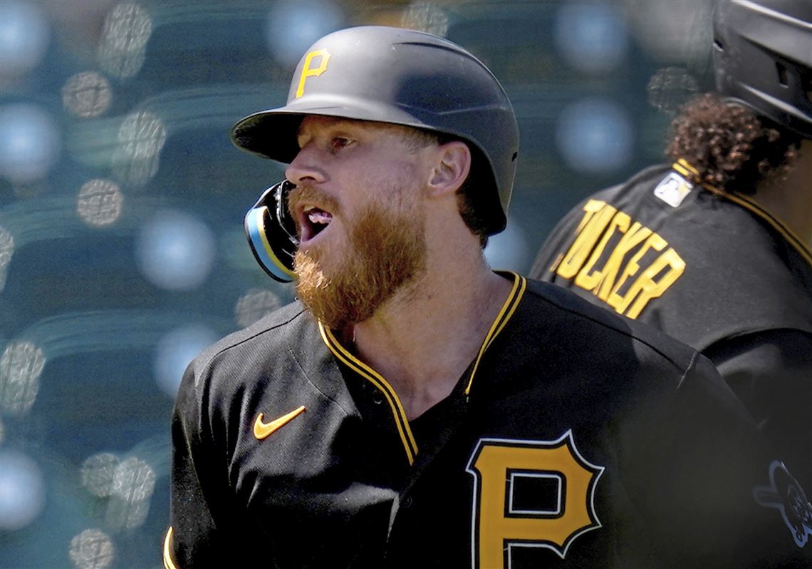 Pittsburgh Pirates' Yoshi Tsutsugo, left, tips his helmet as he