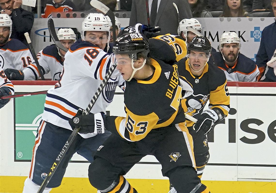 Penguins goaltender Casey DeSmith challenges Teddy Blueger to