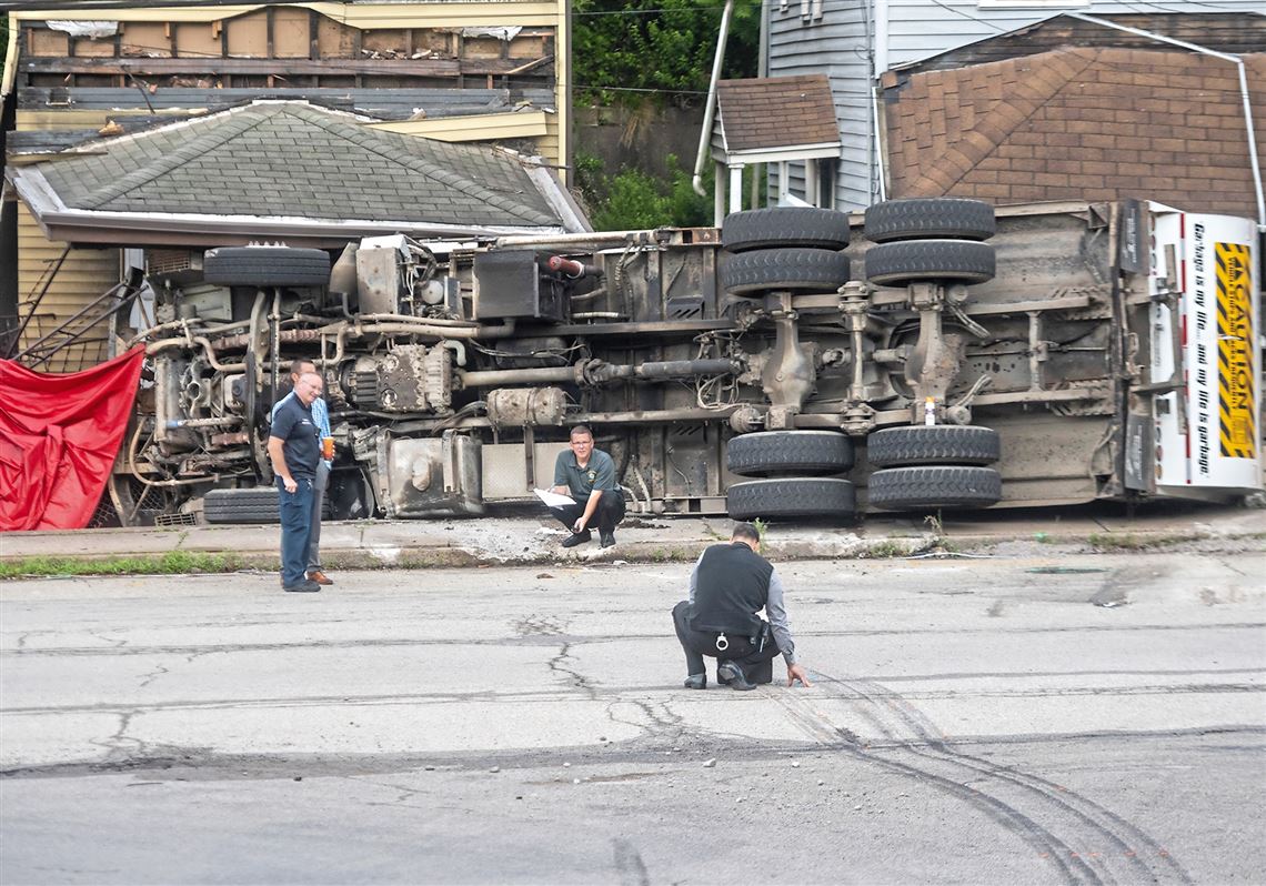 Driver killed when garbage truck crashes into Wilmerding homes