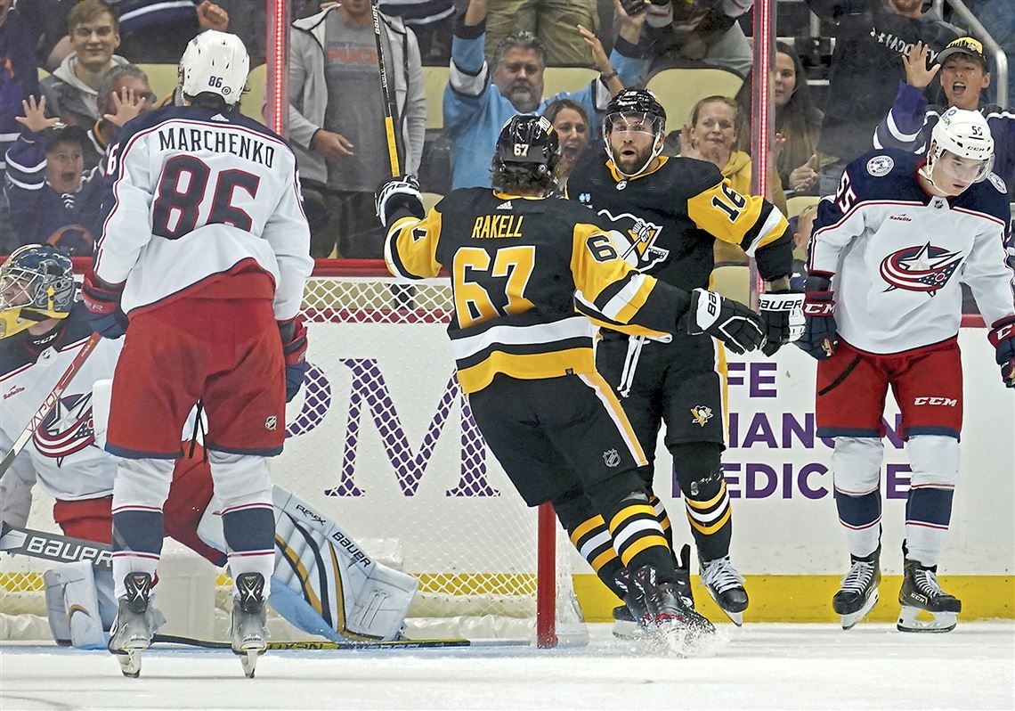 Pittsburgh Penguins' Rickard Rakell (67) celebrates his goal against the  Florida Panthers with Jason Zucker (16) during the first period of an NHL  hockey game in Pittsburgh, Tuesday, Jan. 24, 2023. (AP