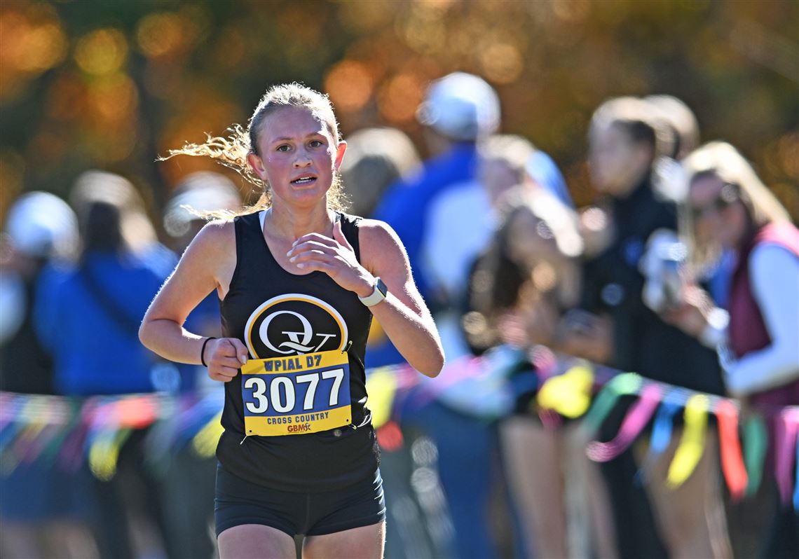 Quaker Valley Cecilia Montagnese comes across the finish line as she won the WPIAL Class 2A cross country championship at White Oak Park.