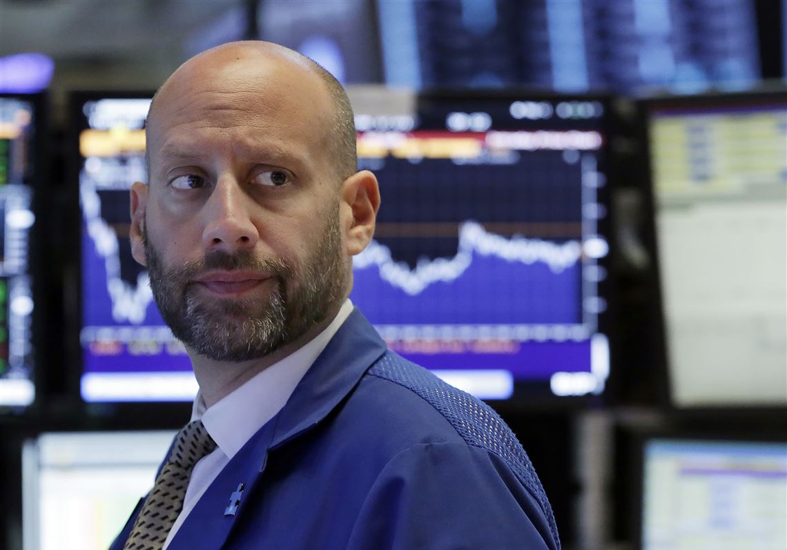 Specialist Meric Greenbaum works on the floor of the New York Stock Exchange, Wednesday, June 14, 2017. A weak report on retail sales sent bond yields lower and high-dividend stocks like utilities and real estate companies higher. (AP Photo/Richard Drew)