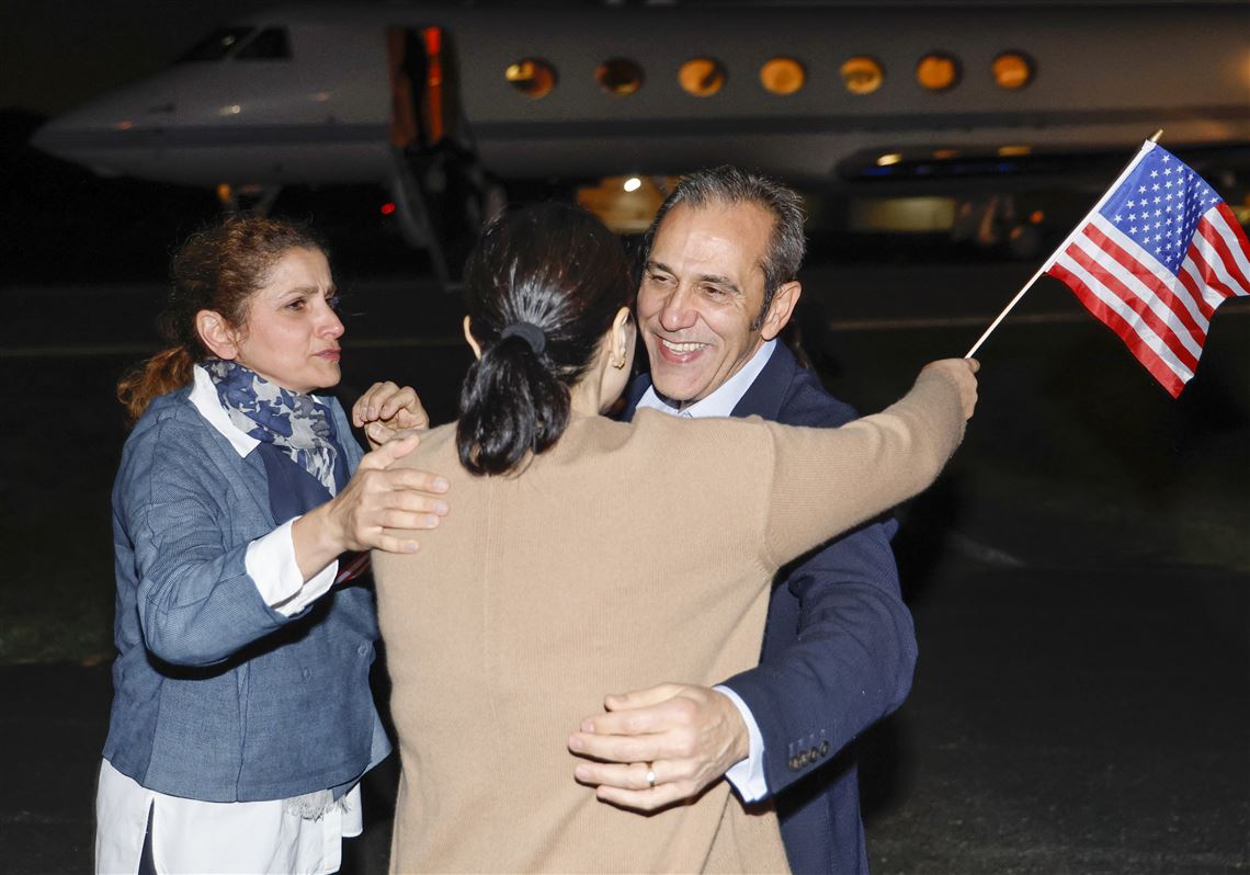 Americans released by Iran arrive home, tearfully embrace their loved