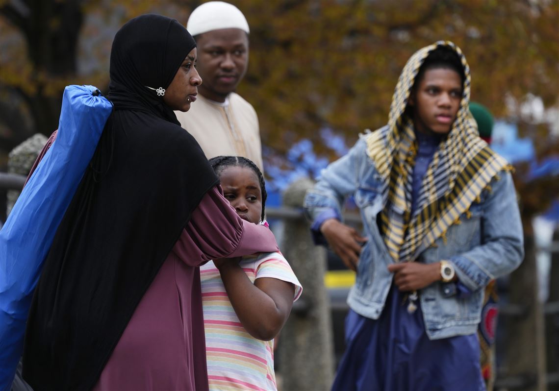 People gather in the aftermath of a shooting Wednesday at an Eid al-Fitr event in Philadelphia. 