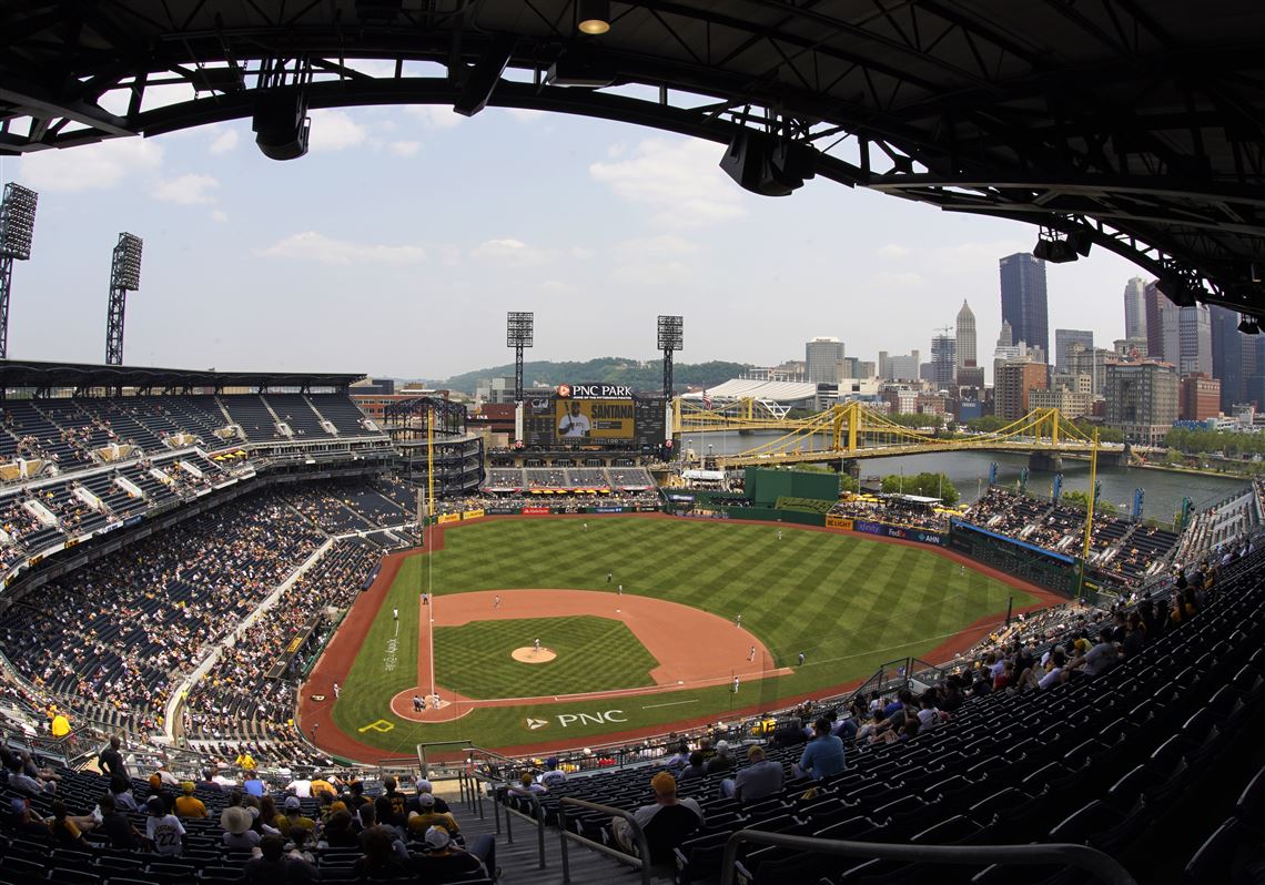 Play paused in Pirates-Cubs game after fan falls onto field from Clemente wall