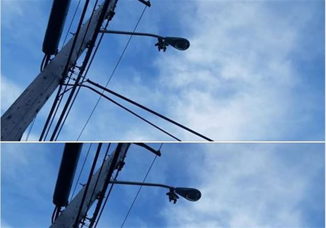 City investigating doll found hanging from street light