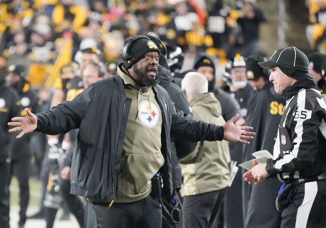 Pittsburgh Steelers head coach Mike Tomlin, center, calls out instructions  from the sideline during the second half of a preseason NFL football game  against the Jacksonville Jaguars, Saturday, Aug. 20, 2022, in