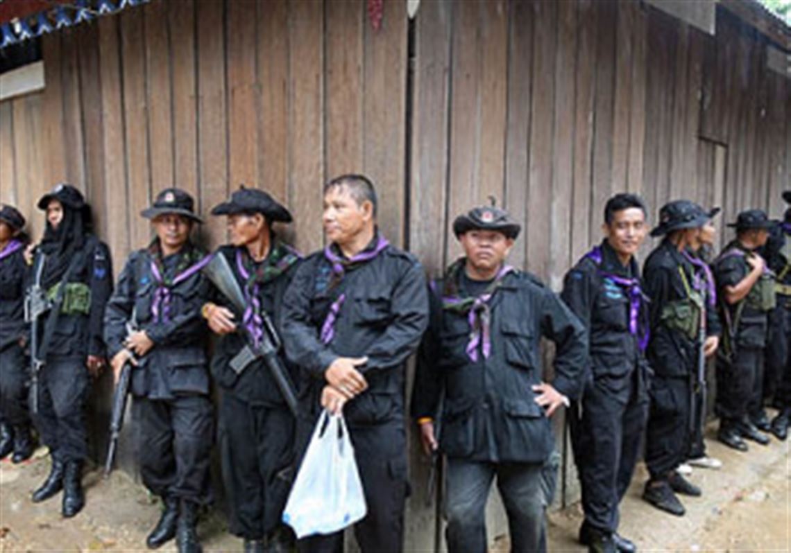 PREAH VIHEAR, Cambodia -- Thai soldiers stand near a disputed border between Thailand and Cambodia north of Phnom Penh. Officials will meet this week to resolve a standoff over their border close to an ancient temple.