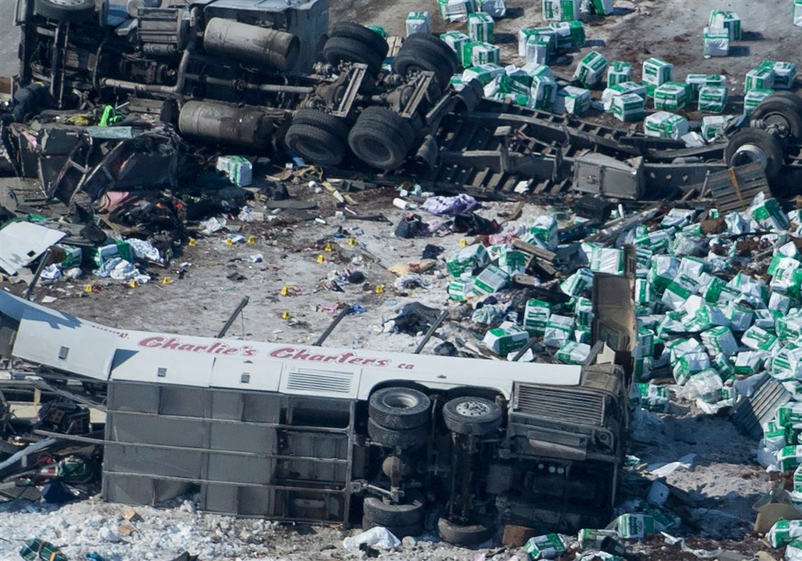 15 die when truck collides with hockey team's bus in Canada