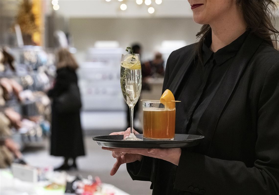 Champagne and shoes: Luxury stores adapt to changing shopper