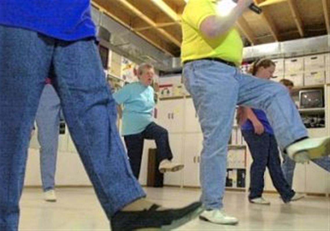The Mon Valley Cloggers practice in Forward in 2002. The 17-member dance group has performed in 622 shows at county fairs, schools, senior living facilities, festivals and more.
