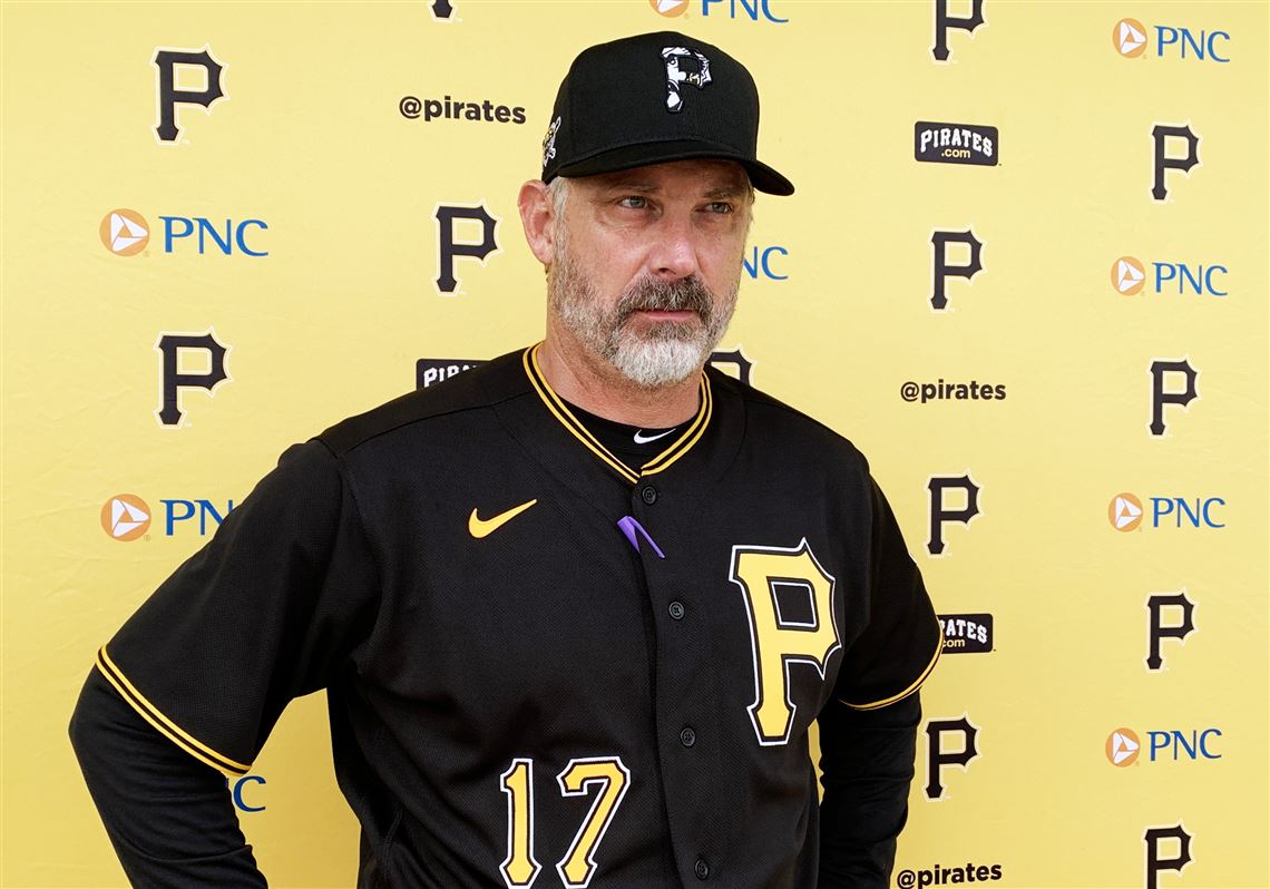 Derek Shelton of the Pittsburgh Pirates puts himself between home News  Photo - Getty Images