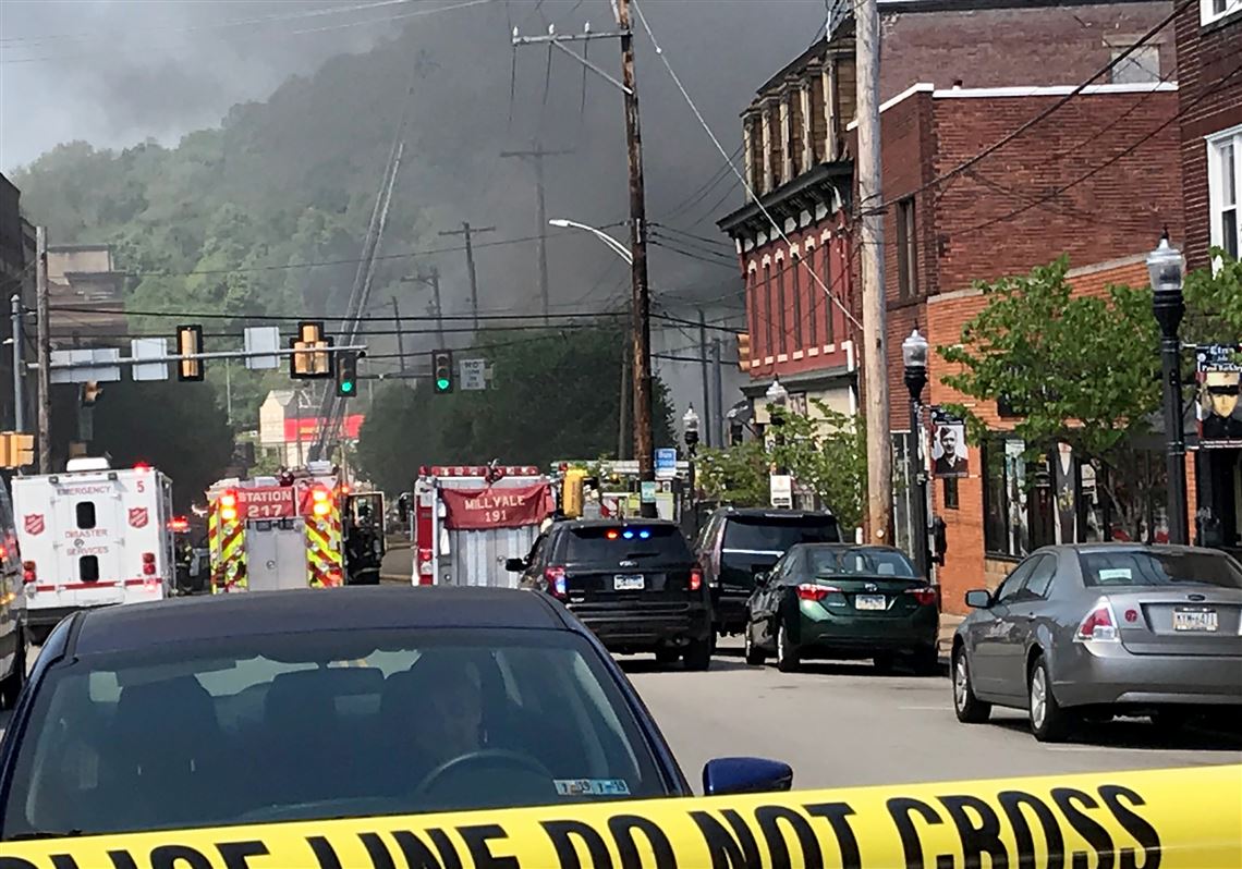 Crews work to extinguish fire at large commercial building in Etna