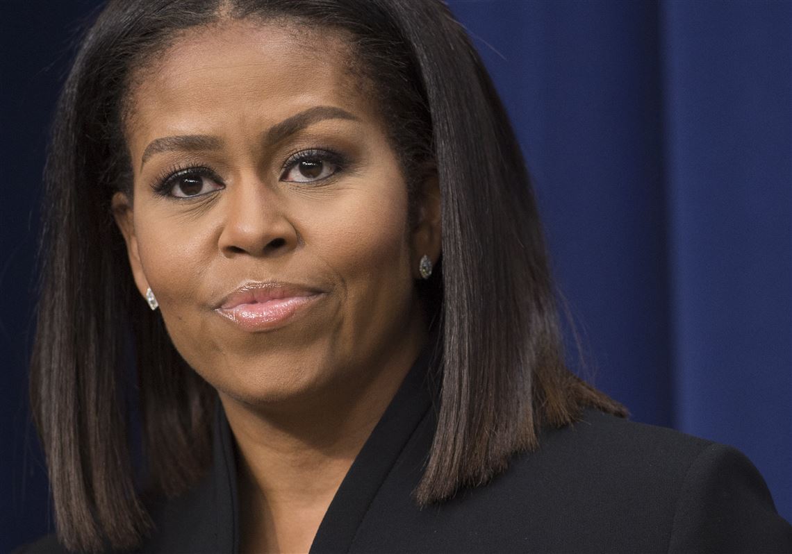 Michelle Obama accuses Trump of racism, urges Americans alienated by ...