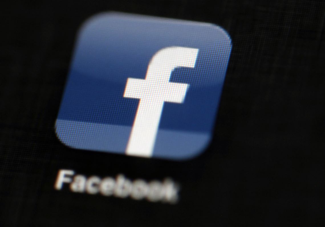The Facebook logo is displayed on an iPad in Philadelphia. Facebook is asking a federal court to dismiss a revised complaint against it by the Federal Trade Commission, arguing that the agency has not provided enough evidence to show that the company is a monopoly.