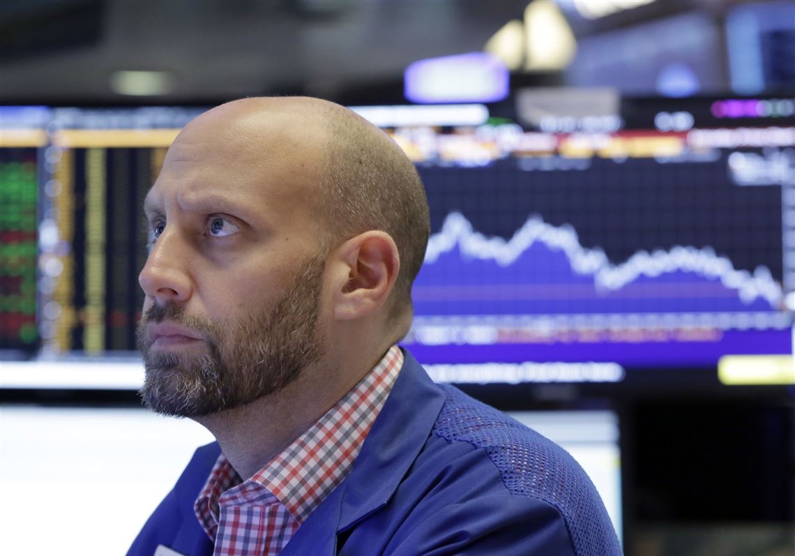 Specialist Meric Greenbaum works at his post on the floor of the New York Stock Exchange, Friday, May 26, 2017. Stocks are opening a bit lower after a six-day winning streak. (AP Photo/Richard Drew)
