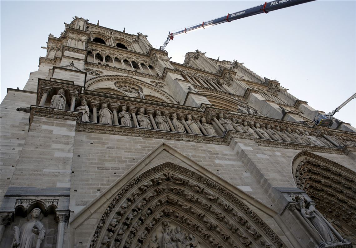 A crane works at Notre Dame cathedral in Paris on April 19.