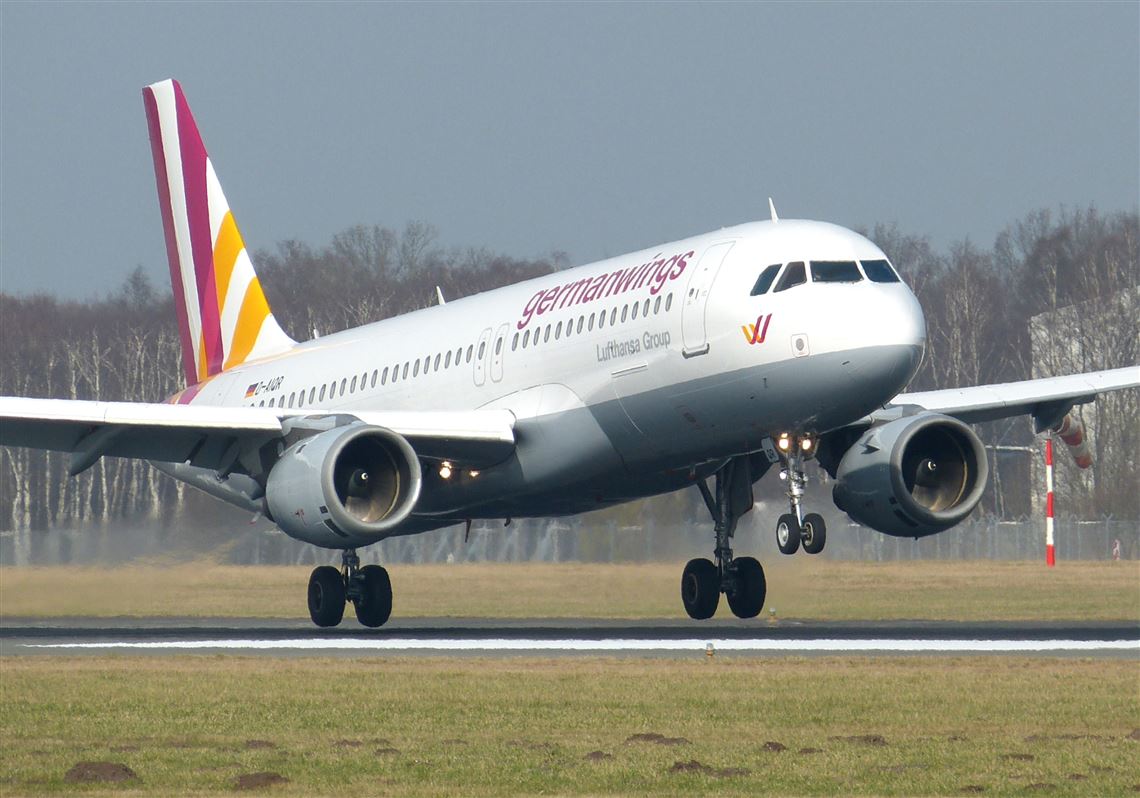 The March 7, 2014, photo shows an Airbus A320 of German airline Germanwings as it lands at the airport in Hamburg, northern Germany. A Germanwings passenger jet carrying 148 people crashed in the French Alps region as it traveled from Barcelona to Duesseldorf Tuesday, March 24, 2015