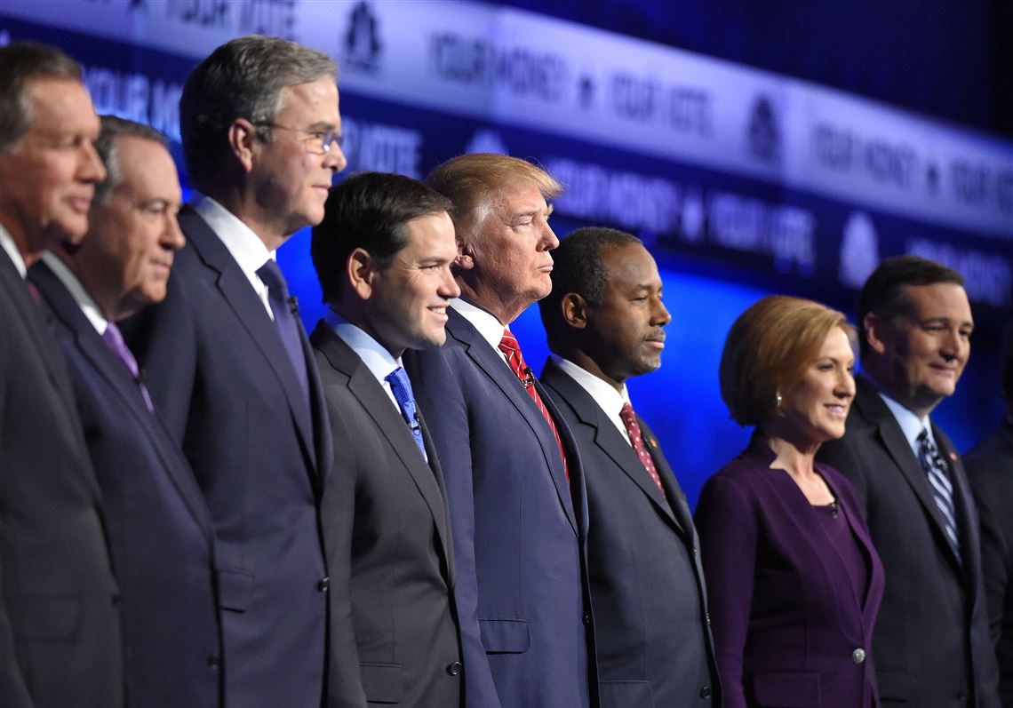 Republican presidential candidates, from left, John Kasich, Mike Huckabee, Jeb Bush, Marco Rubio, Donald Trump, Ben Carson, Carly Fiorina, and Ted Cruz take the stage during the CNBC Republican presidential debate at the University of Colorado in late October. 